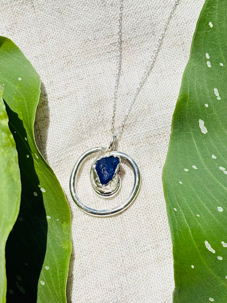 Blue signature swirl sea glass necklace